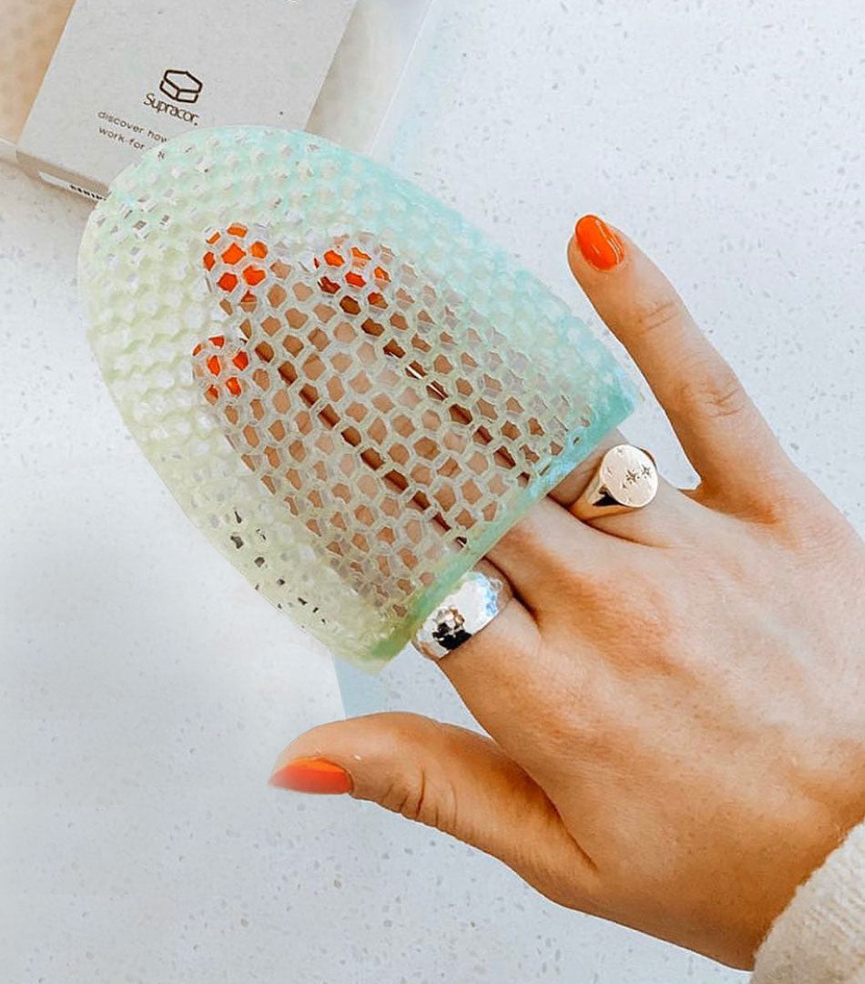 facial sponge holding in hands