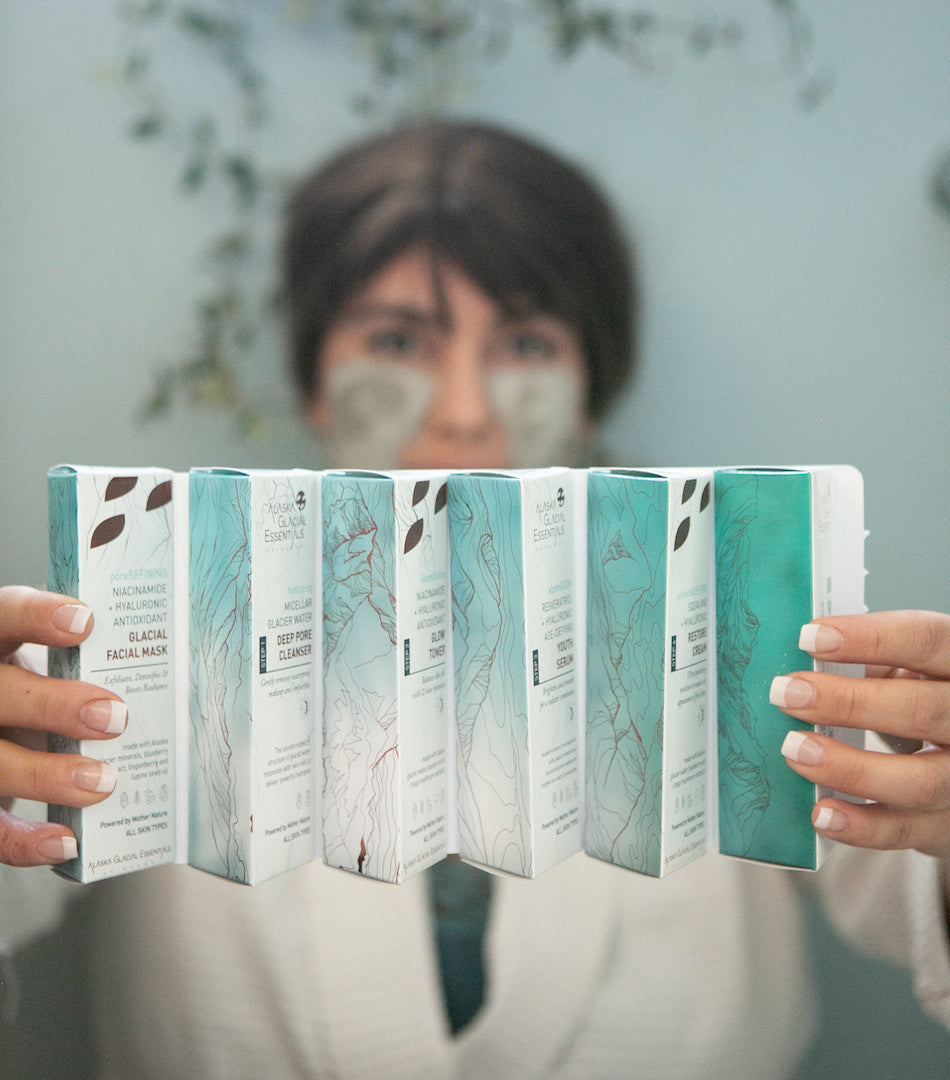 woman holding skin kit
